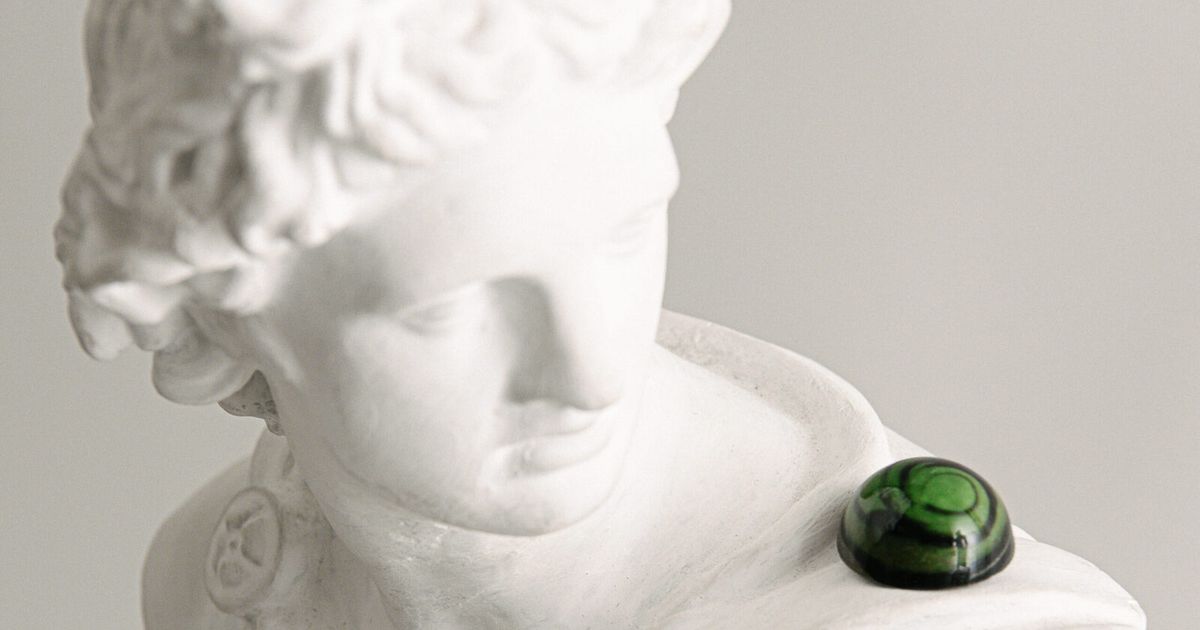 ASKA_artisan_chocolate_praline_on_statue